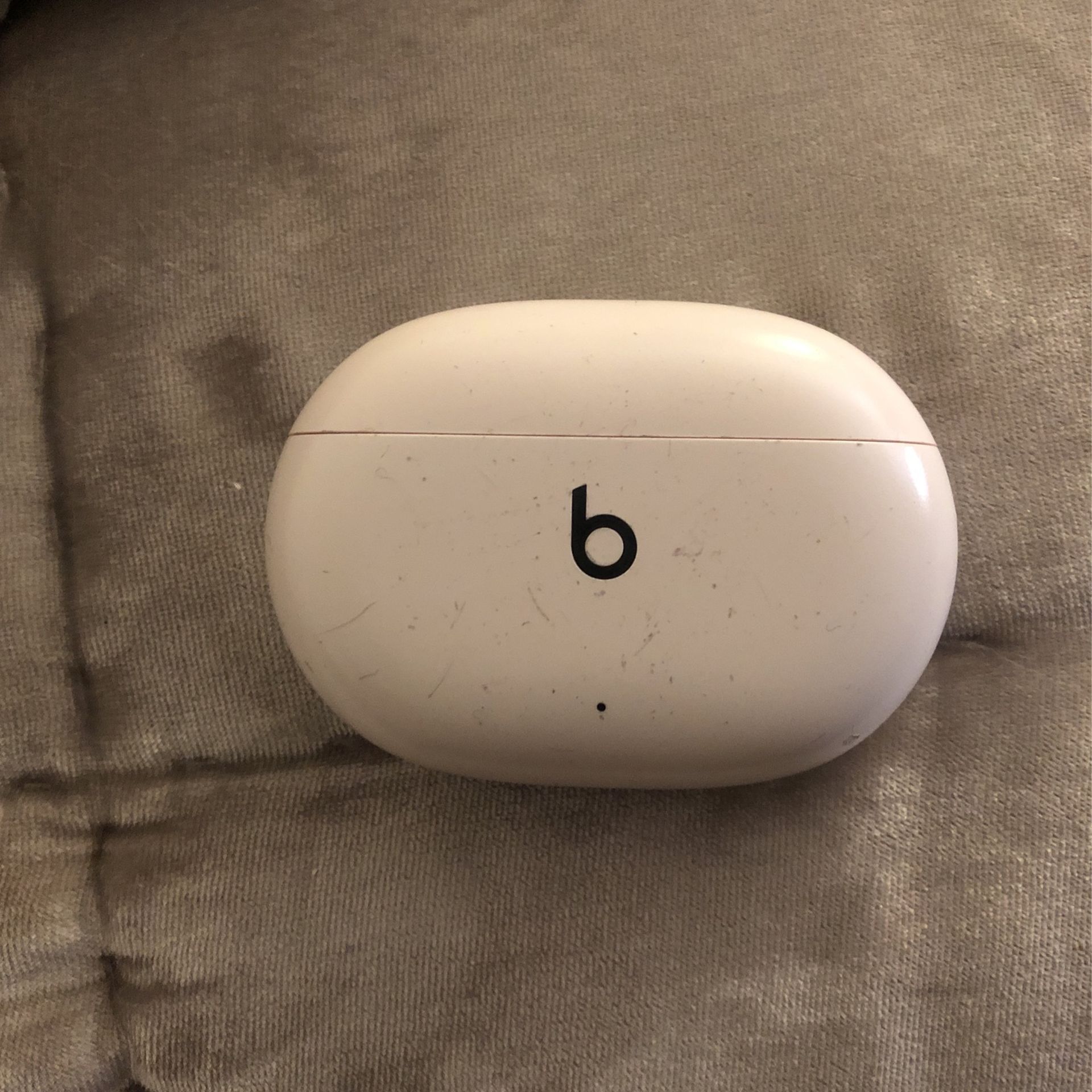 Beats Studio Buds. Left Earbuds and Case