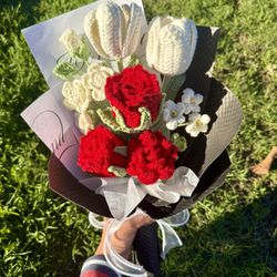 Crocheted red roses and white tulips bouquet