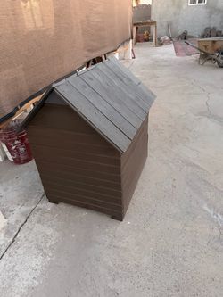 Wood dog house