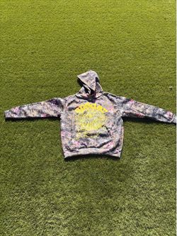 This hoodie looks so cool! The spiderweb design with the yellow accents is really eye-catching. It's giving off major "caught in a web of style" vibes