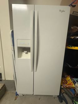 Whirlpool side by side fridge $200