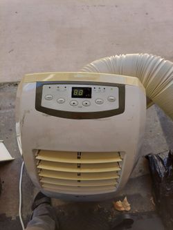 LG portable air-conditioning unit with hose and window covering included