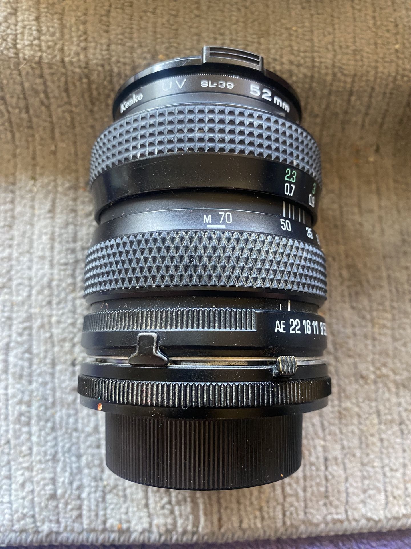 TAMRON 28-70 mm F/3.5-4.5 Standard Tele-Macro Zoom Lens. Camera
