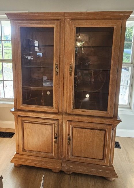 (2)Dining room/living room china cabinets, solid wood, lighted w/ glass shelves and storage below