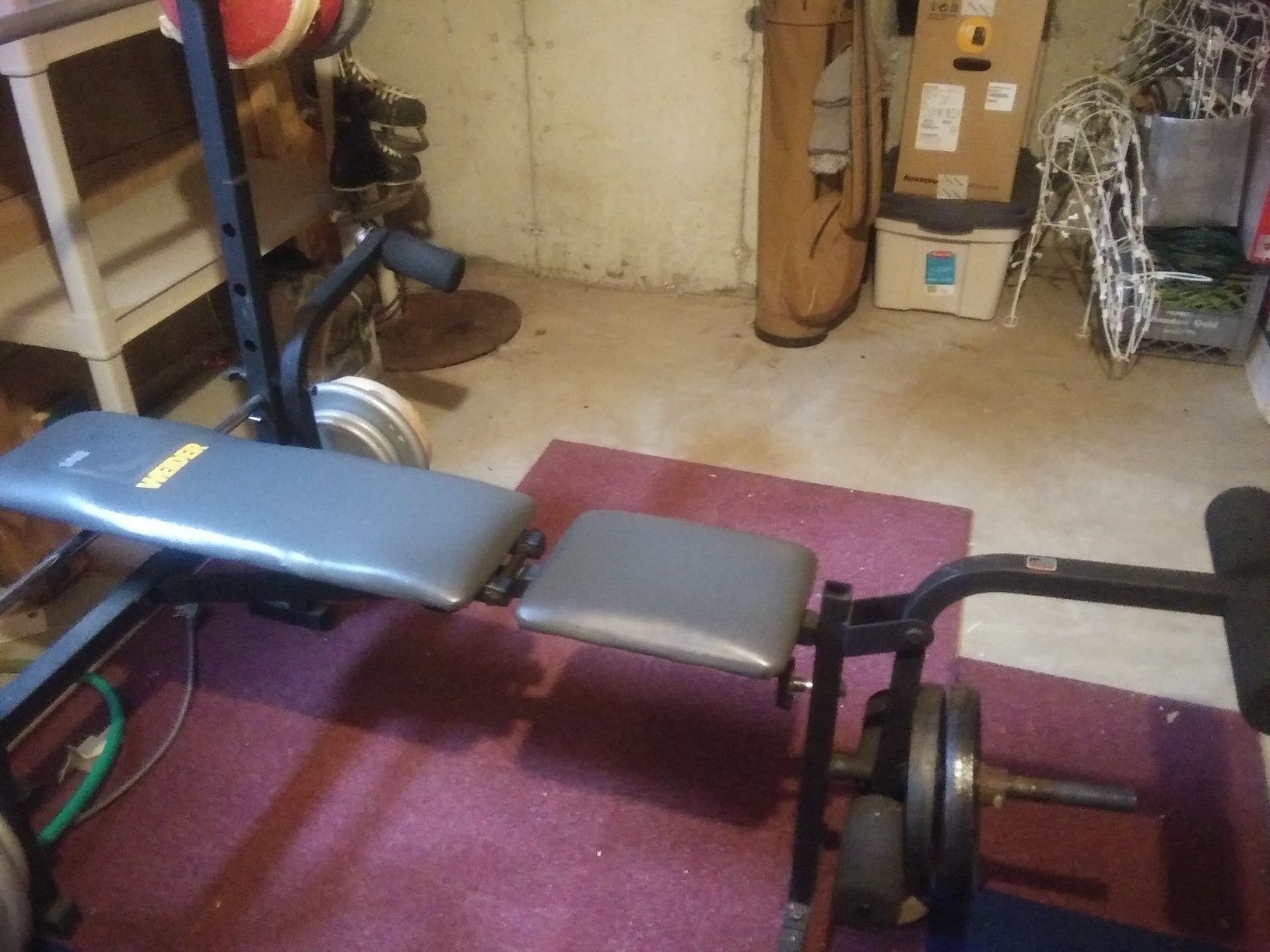 Joe Weider weight bench, bar bell, dumbells and 280 lbs of weights. 160 lbs of 280 lbs is steel