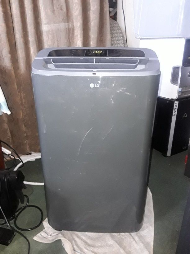 LG Potable Air Conditioner A/C Blows Cold LP1213GXR 12000 BTU