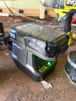 Used Ryobi tools battery and charger