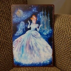 DISNEY "CINDERELLA" METAL SIGN.  12" X 8".  NEW.  PICKUP ONLY.