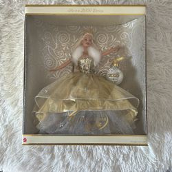 Year 2000   $25.00 Special Edition Celebration Barbie (Blonde)—also known as the Holiday Celebration Barbie (#28269