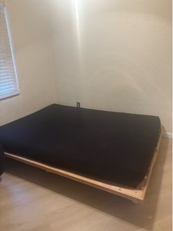 Queen sized pine futon frame and mattress