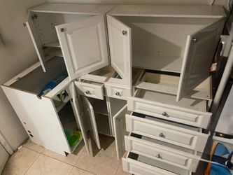 White wooden kitchen cabinets set