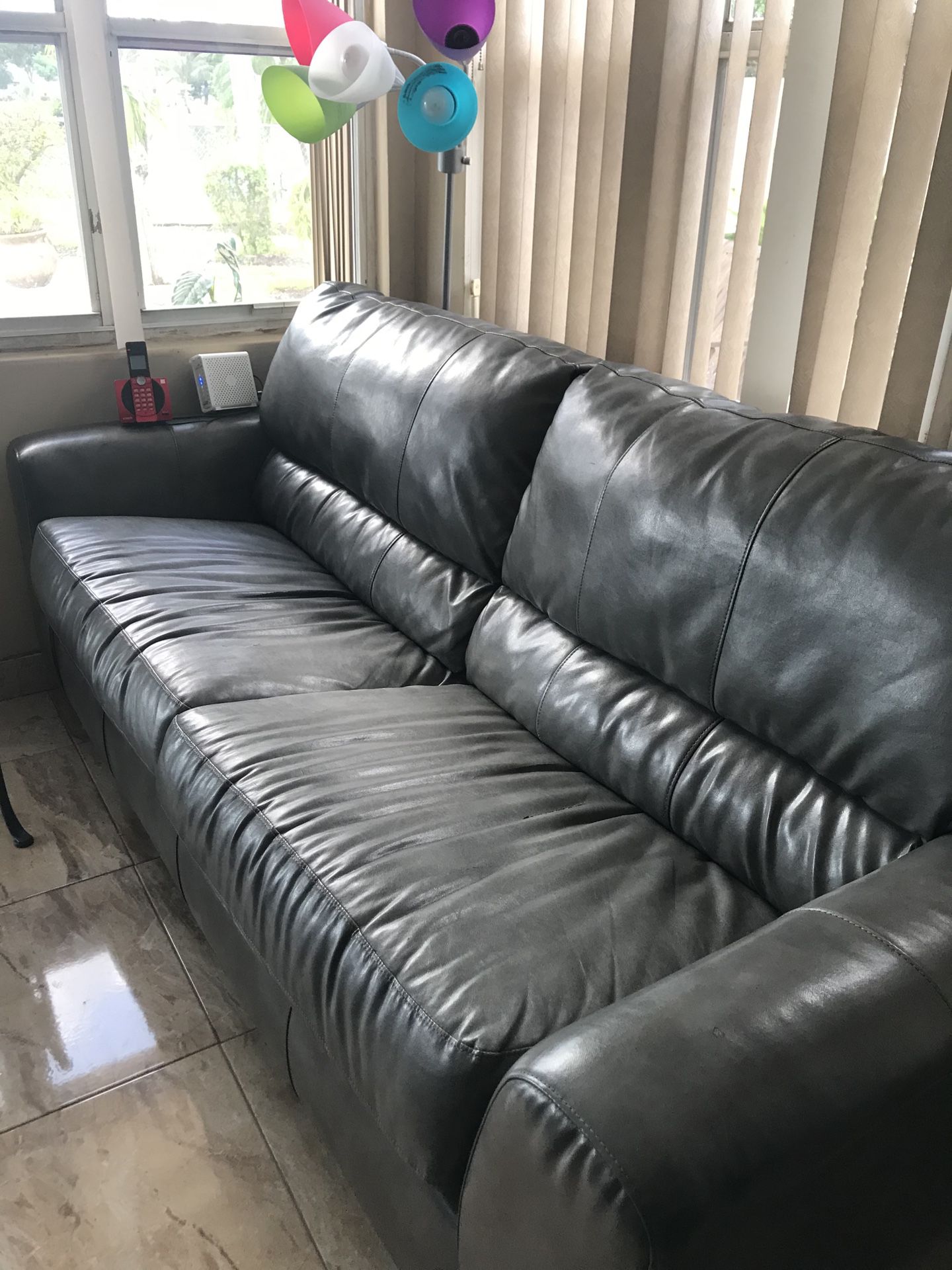 Grey leather couch for sell