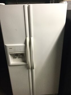 Kenmore side by side refrigerator/ 90 day warranty/ delivery and installation are available
