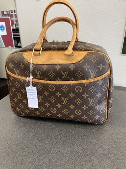 Monogram travel bag