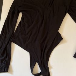 Medium black bodysuit from fashion nova