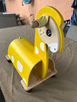 Free Ride-on Giraffe Toy