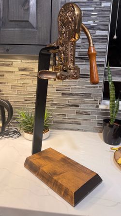 Vintner mounted wine bottle opener