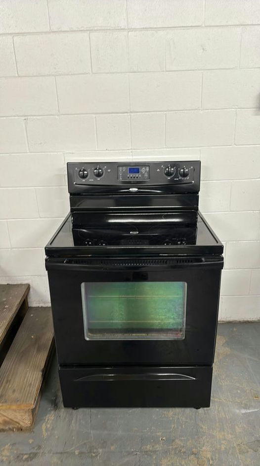 "Black Electric Stove with Glass Top - Good Condition