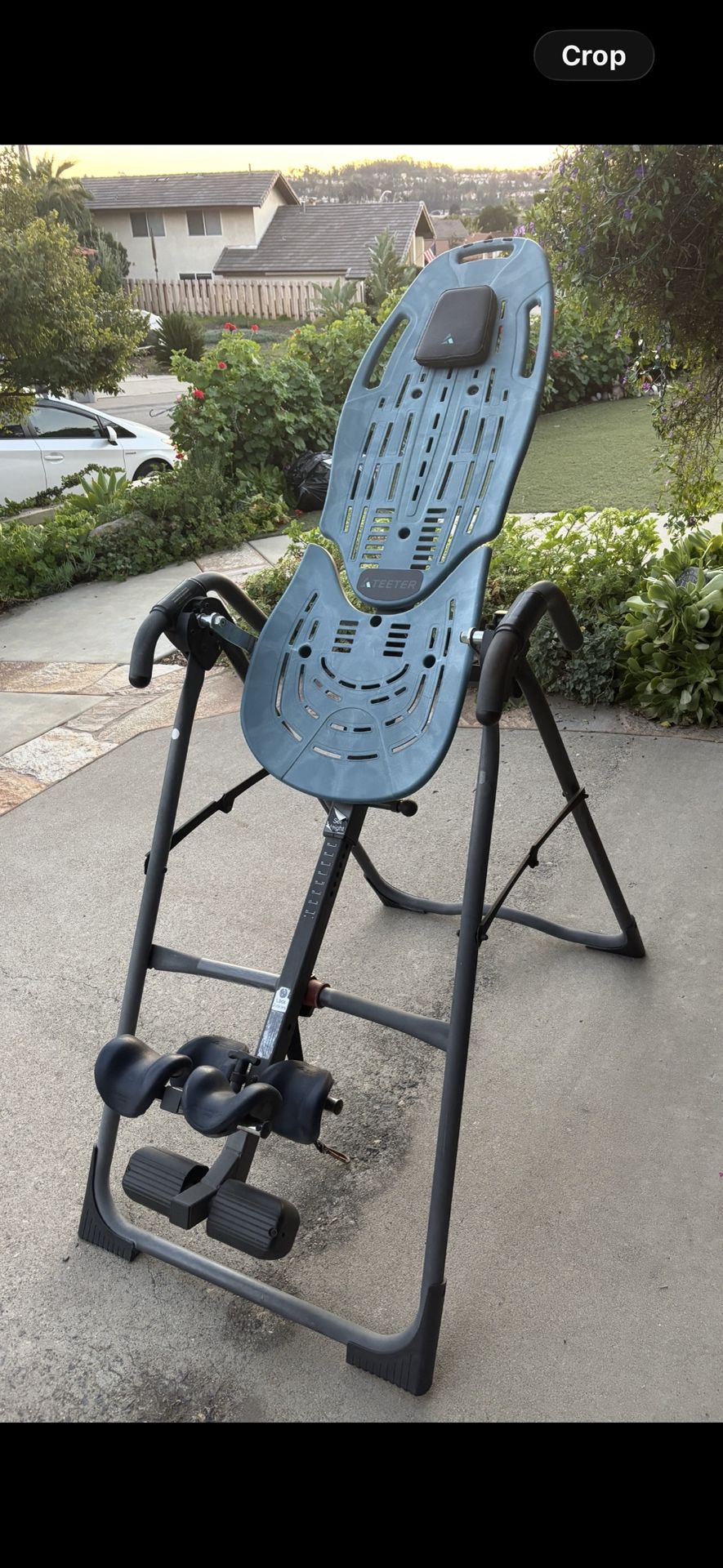 Become taller. The famous Teeter inversion back relief machine
