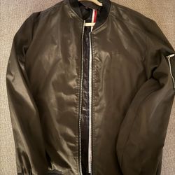 green bomber jacket. 