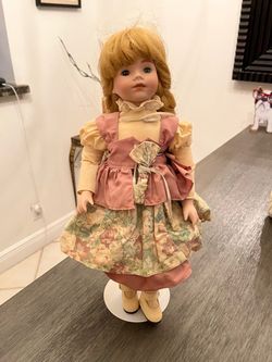 Porcelain Collector Doll with Floral Dress
