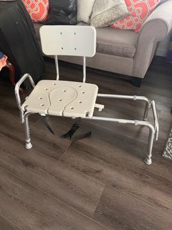 Sliding shower chair