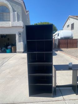 Free black bookshelf, 71 inches tall 24 1/2 inches wide 12 inches deep