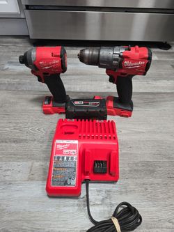 MILWAUKEE M18 SET IMPACT DRIVER ,DRILL M18 XC5.0  BATTERY AND CHARGER