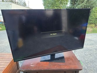 Vizio  60" Flat Screen TV with Stand
