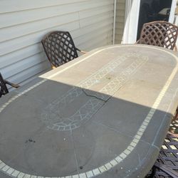 Concrete Table with Very Heavy Chairs