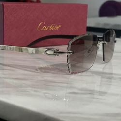 Cartier Glasses -  white buffs