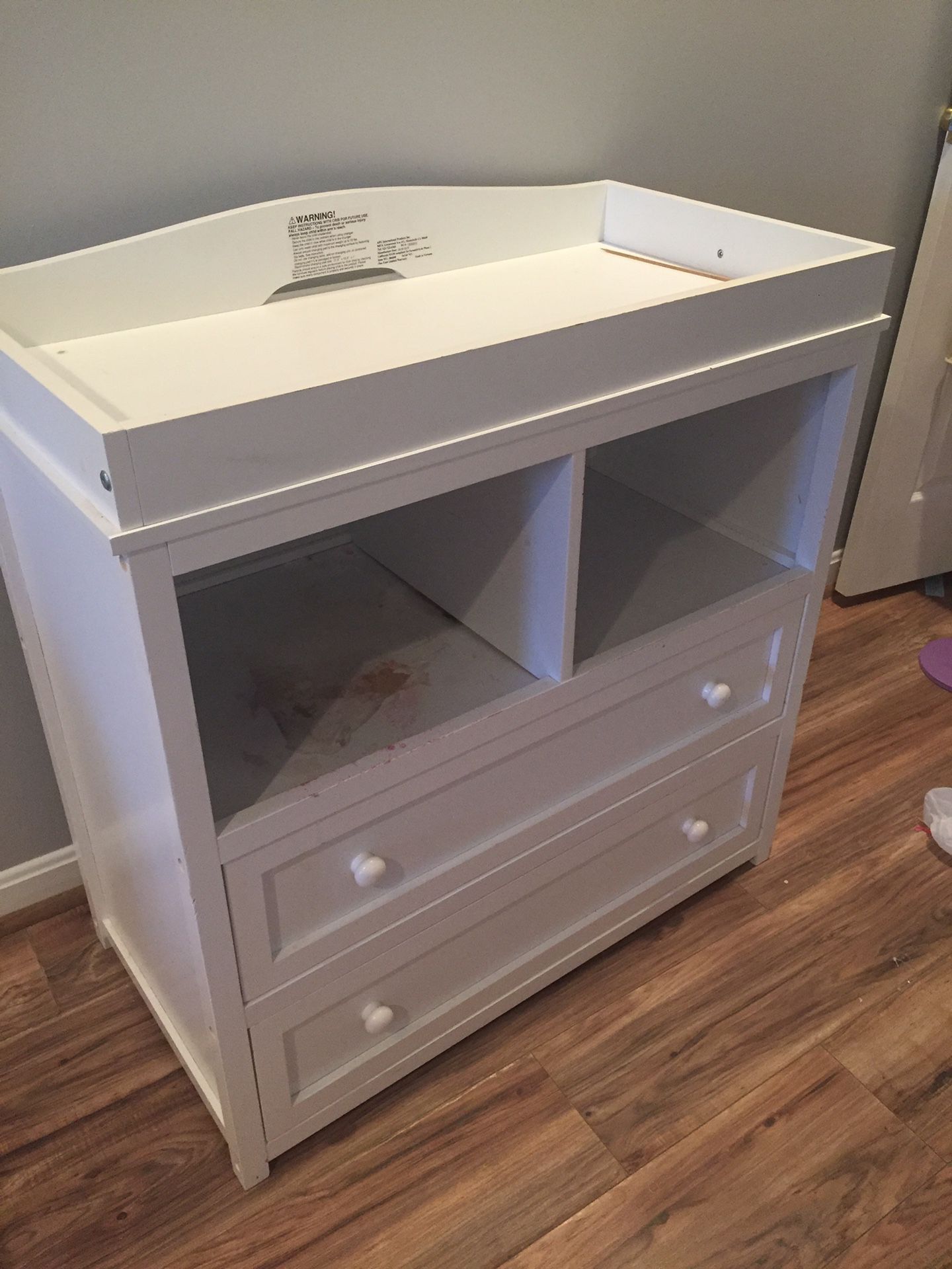 White dresser with changing table
