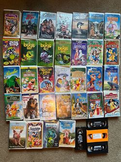 Flat screen TV, Panasonic VHS player, Disney movies