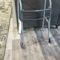 Walker Brand New. still has Tags foldable