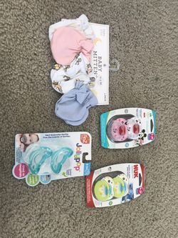 Baby pacifier & baby mittens new ( never used) all for 15 $ each for 4$