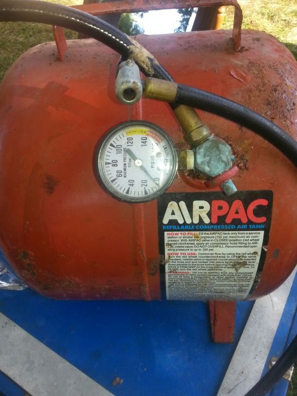 Air pac refillable compressed air tank