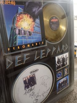 Def Leppard autographed drumhead and record framed signed by all members of the band make an offer pick up in cypress