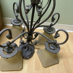 Vintage wrought iron chandeliers