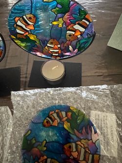 Handpainted Joan Baker Designs glass plate with tropical fish design with tea light candle stand #handpainted #tropical fish 🐟. The size of the desig
