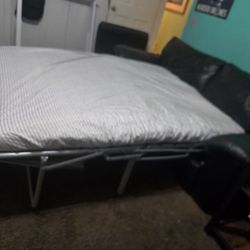 blue sofa bed with mattress