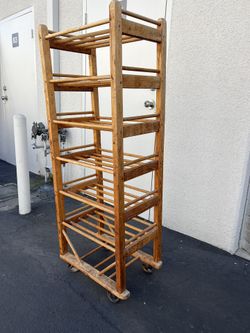 Unique Vintage Wooden Rack With Iron Wheels