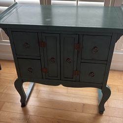 Turquoise table with drawers