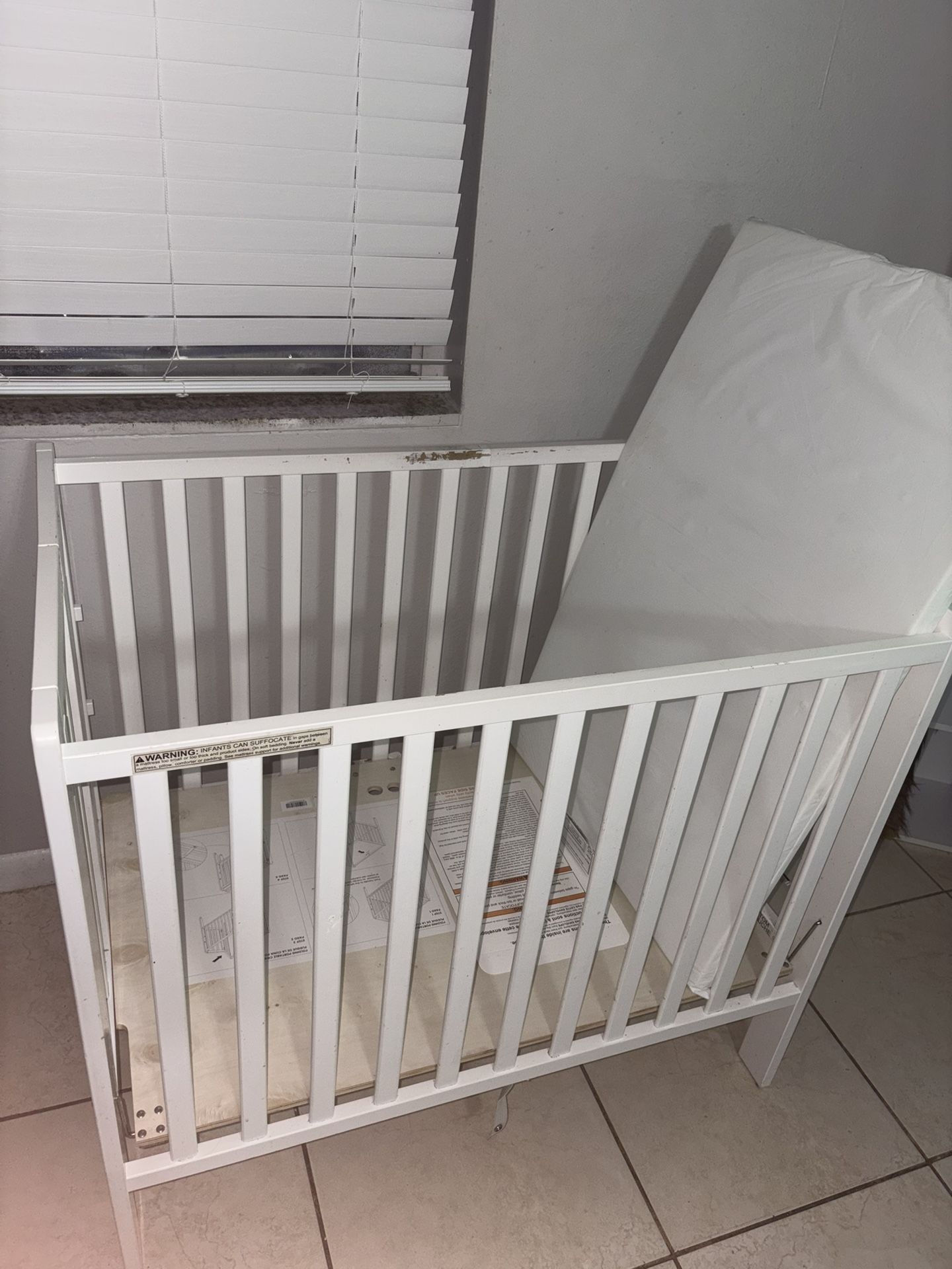 Mini Convertible Baby Crib — $40