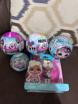 LOL BALLS $8 each top row $5 small ball and $3 figurine or $30 all