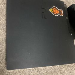 PS3 And Three Games With Cords And One Controller 