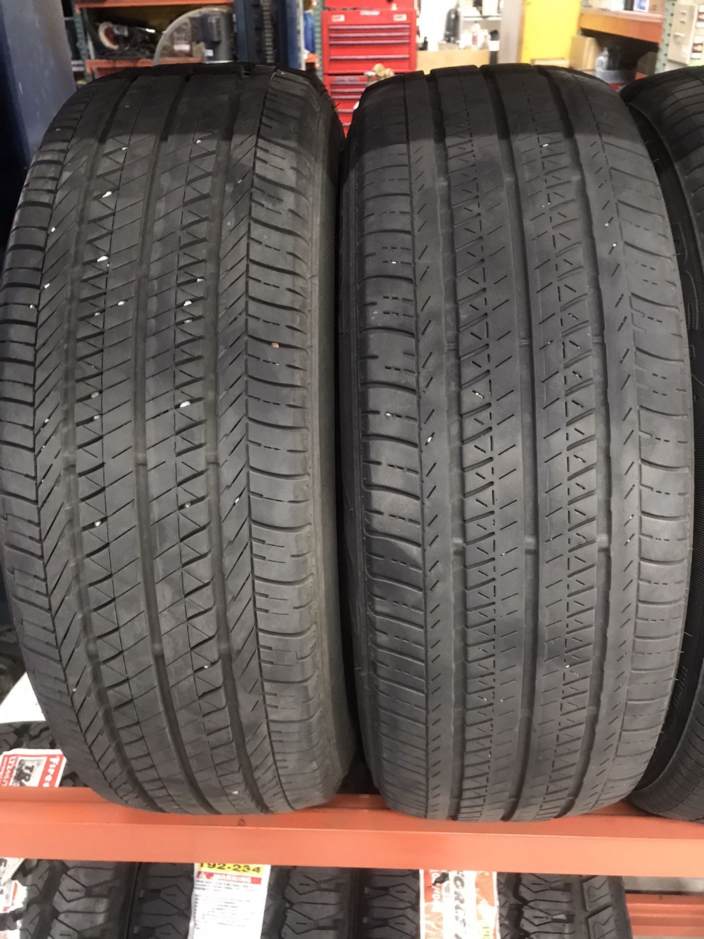 A pair of used Bridgestone 195/65R15 195-65-15 Tire Tires