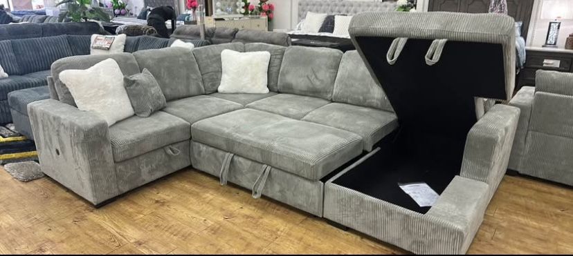 New Sleeper Sectional Couch With Storage / Free delivery