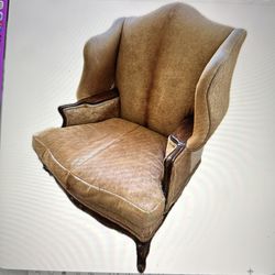 Gorgeous wingback cowhide chair