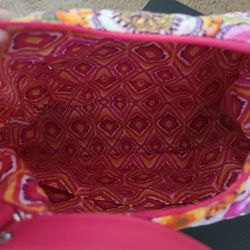 Pink Vera Bradley Purse with wallet.  Both items are used. The wallet has a little  more wear than the purse.