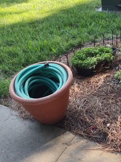 75 ft plus... rubber hose -- with OR without pot 20" diameter x 15" deep